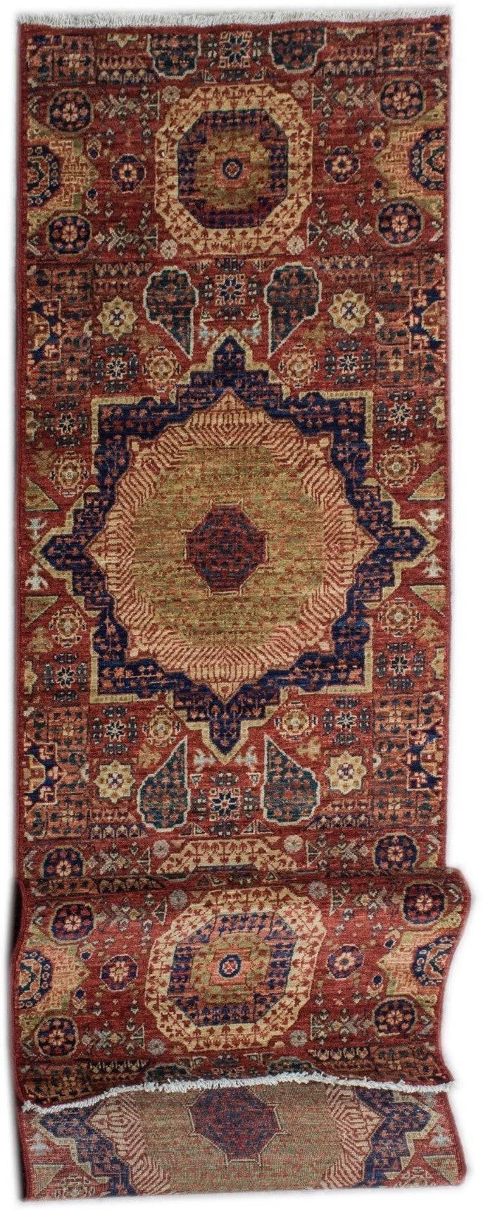 A handmade Afghan Chobi runner rug featuring a traditional Mamluk medallion design in red and gold.