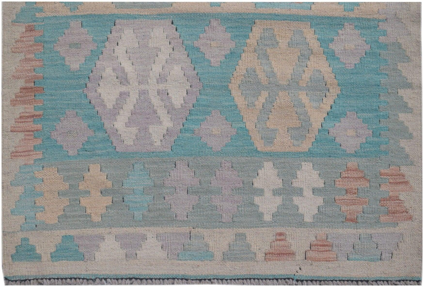 Handmade Afghan Maimana kilim runner featuring geometric patterns in soft blue, tan, and purple.