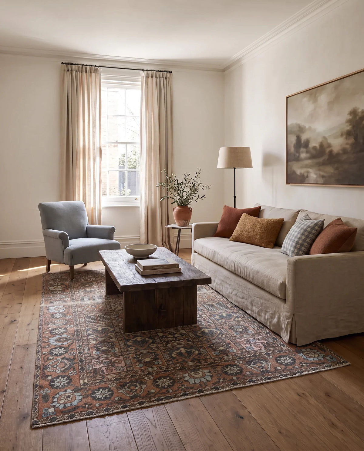 Vintage Persian Bakhtiari rug with a multi-coloured Khesti garden panel pattern in a sunlit living room.