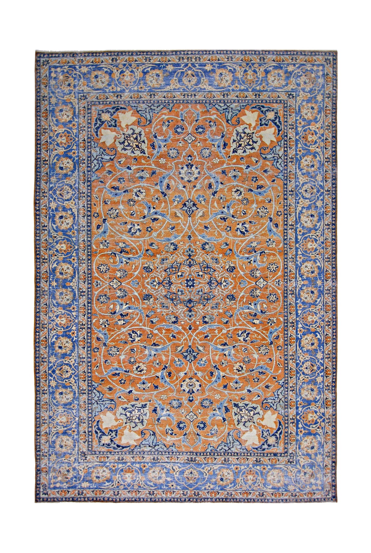 Hand-knotted vintage Persian Tabriz wool rug featuring an intricate floral medallion in burnt orange and royal blue.