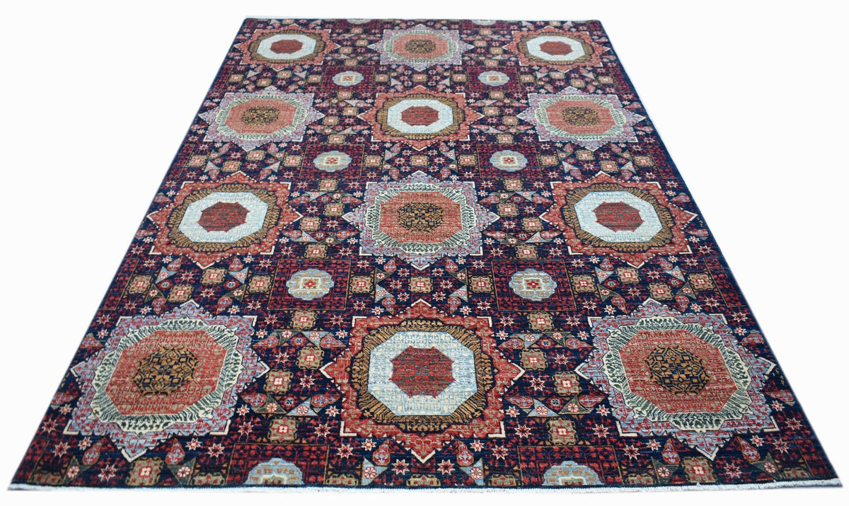 Hand-knotted Afghan Balkh rug featuring a geometric Mamluk design with repeating octagons in deep jewel tones.