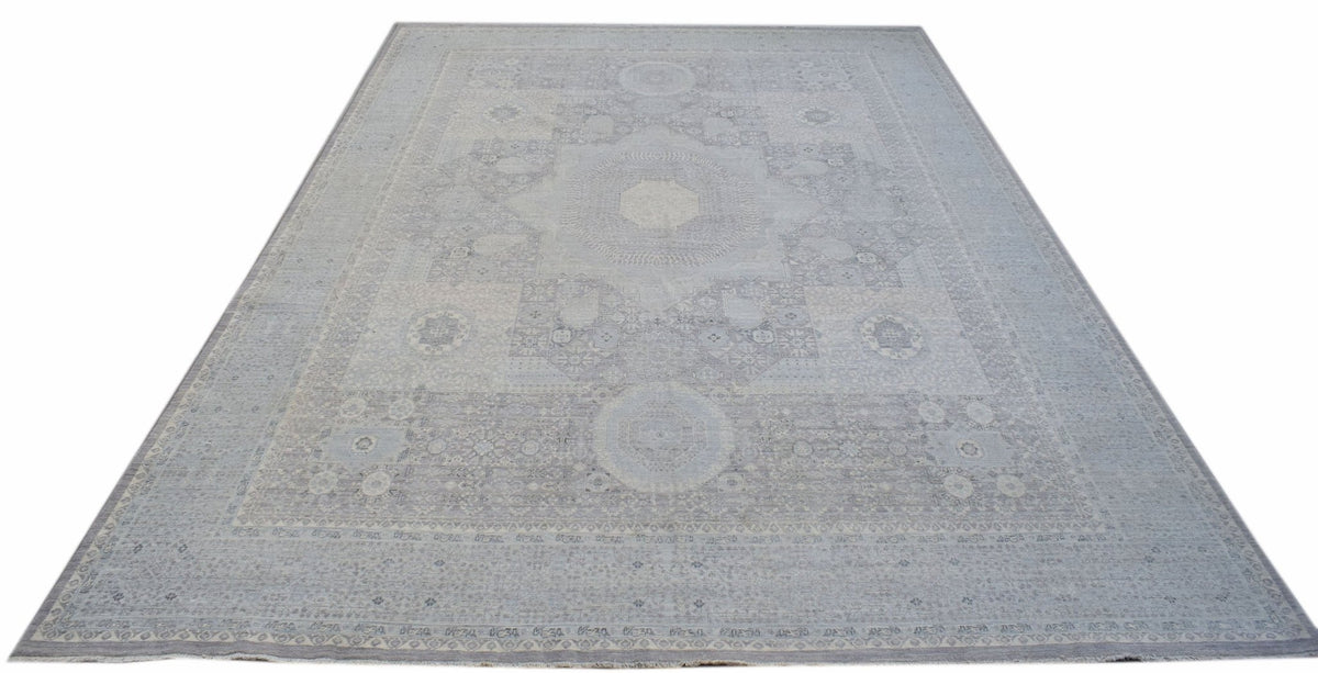 A handwoven Afghan Balkh rug featuring a detailed Mamluk medallion pattern in shades of grey.