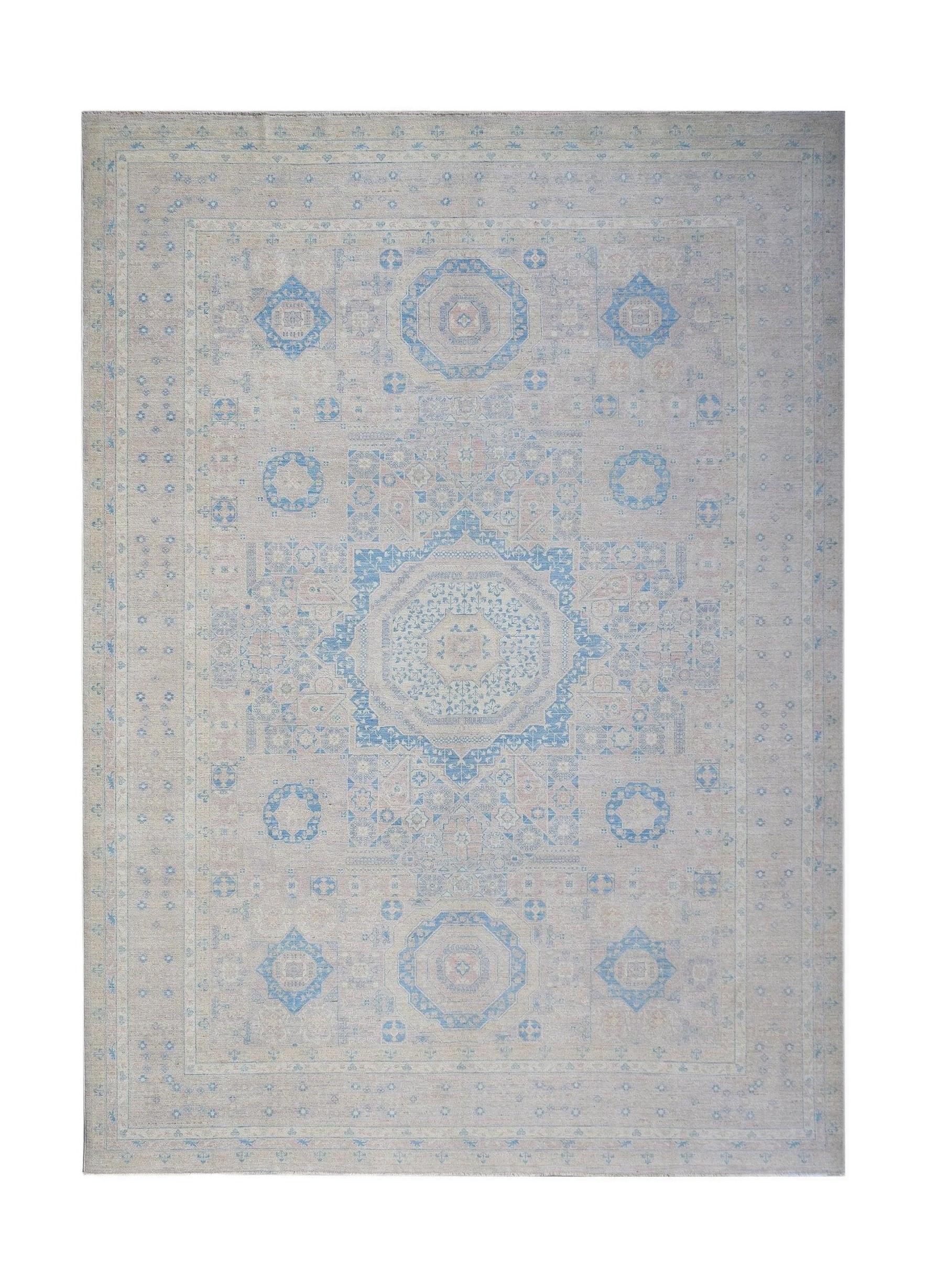 An Afghan Balkh rug featuring a traditional geometric pattern in soft blue and beige tones.
