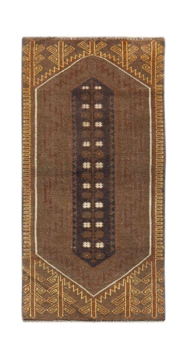 Handmade Afghan Baluch rug featuring a dark brown field with a central geometric column pattern.