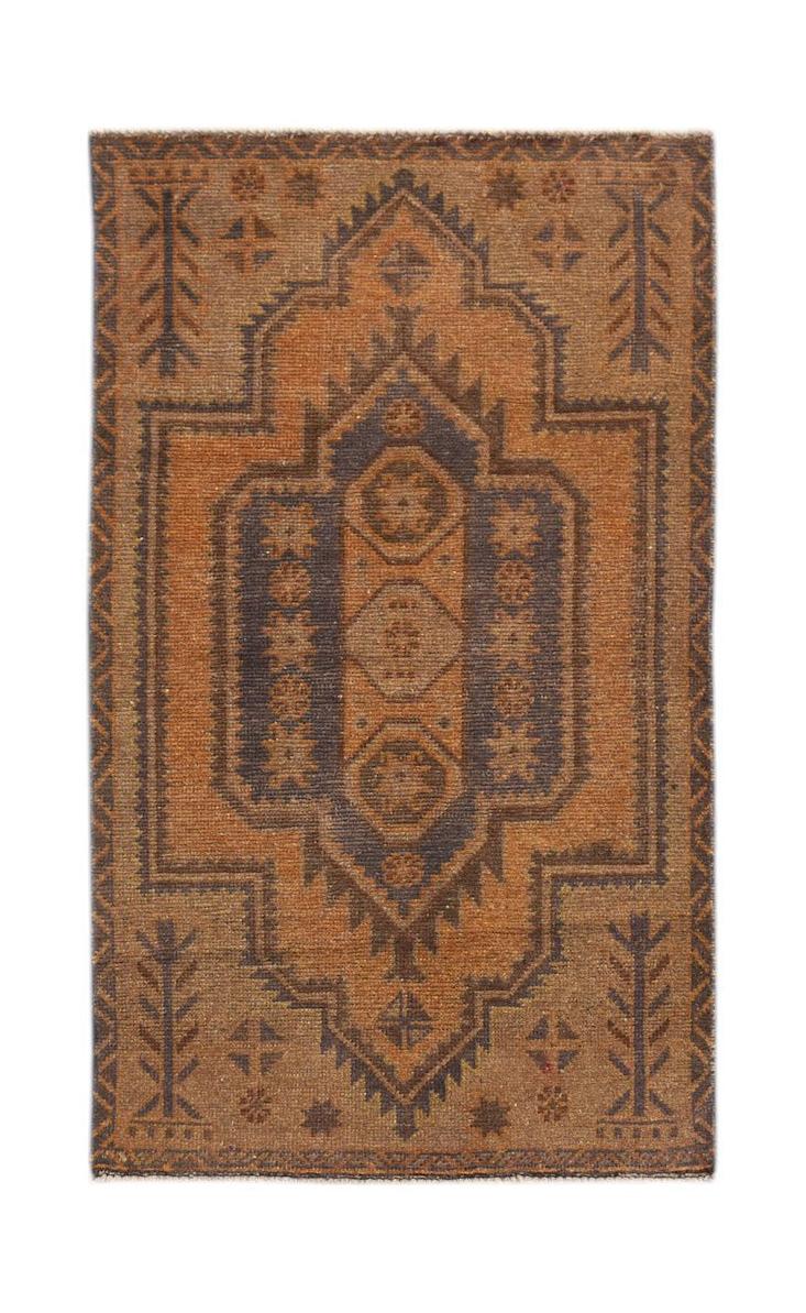 Handmade Afghan Baluch rug featuring a geometric medallion pattern in shades of brown and charcoal.
