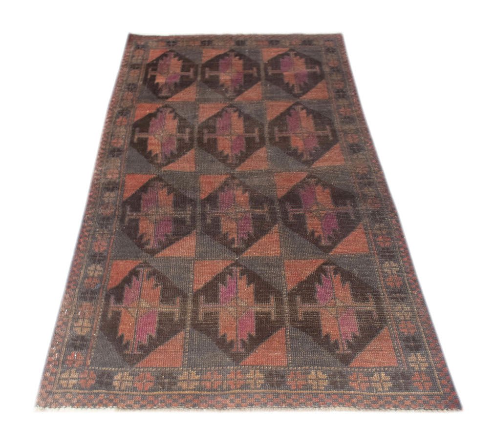 Handmade Afghan Baluch rug featuring a repeating diamond pattern in dark red and charcoal tones.