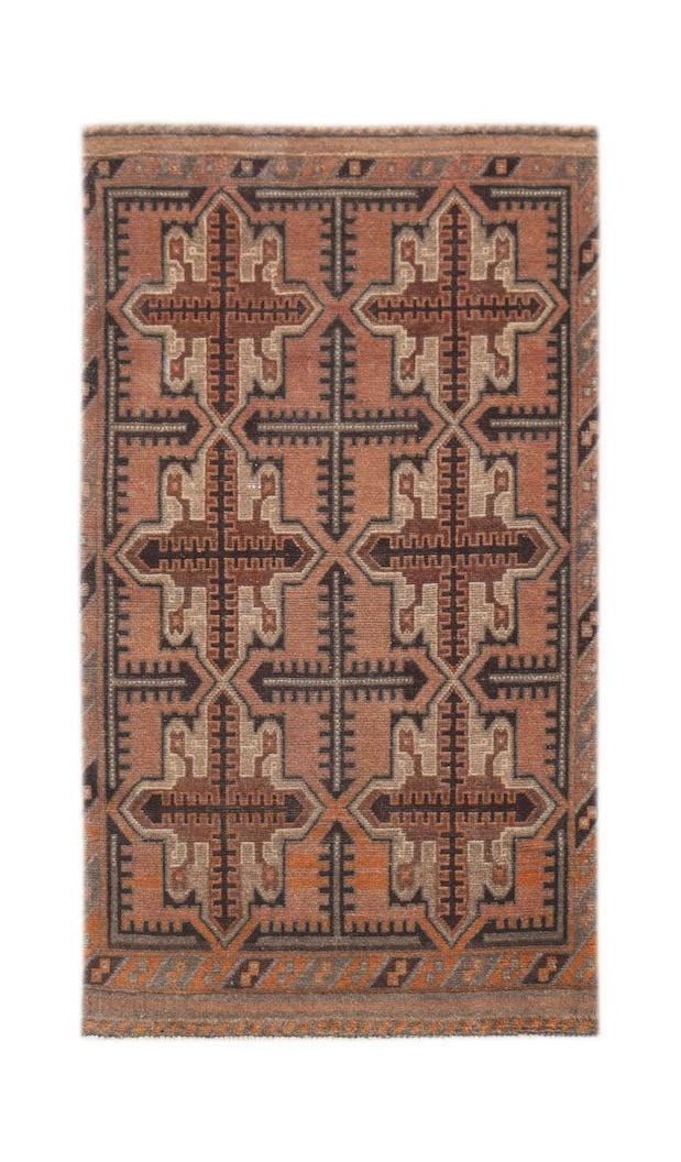 Handmade Afghan Baluch wool rug featuring a repeating geometric pattern in rust and brown tones.