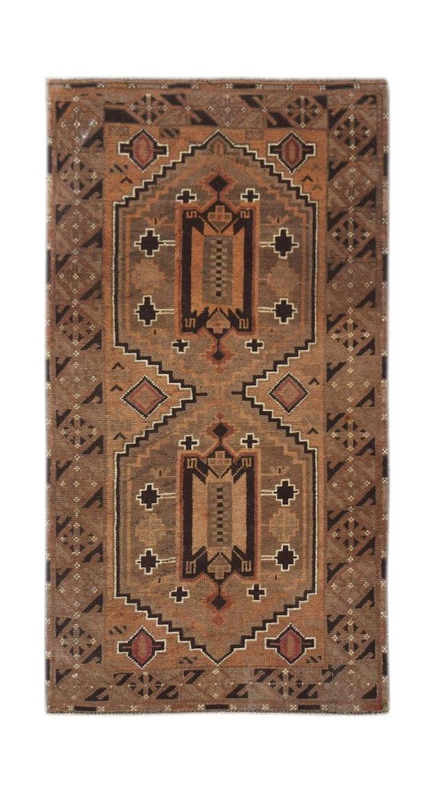 Handmade Afghan Baluch wool rug featuring a geometric pattern in shades of brown and black.