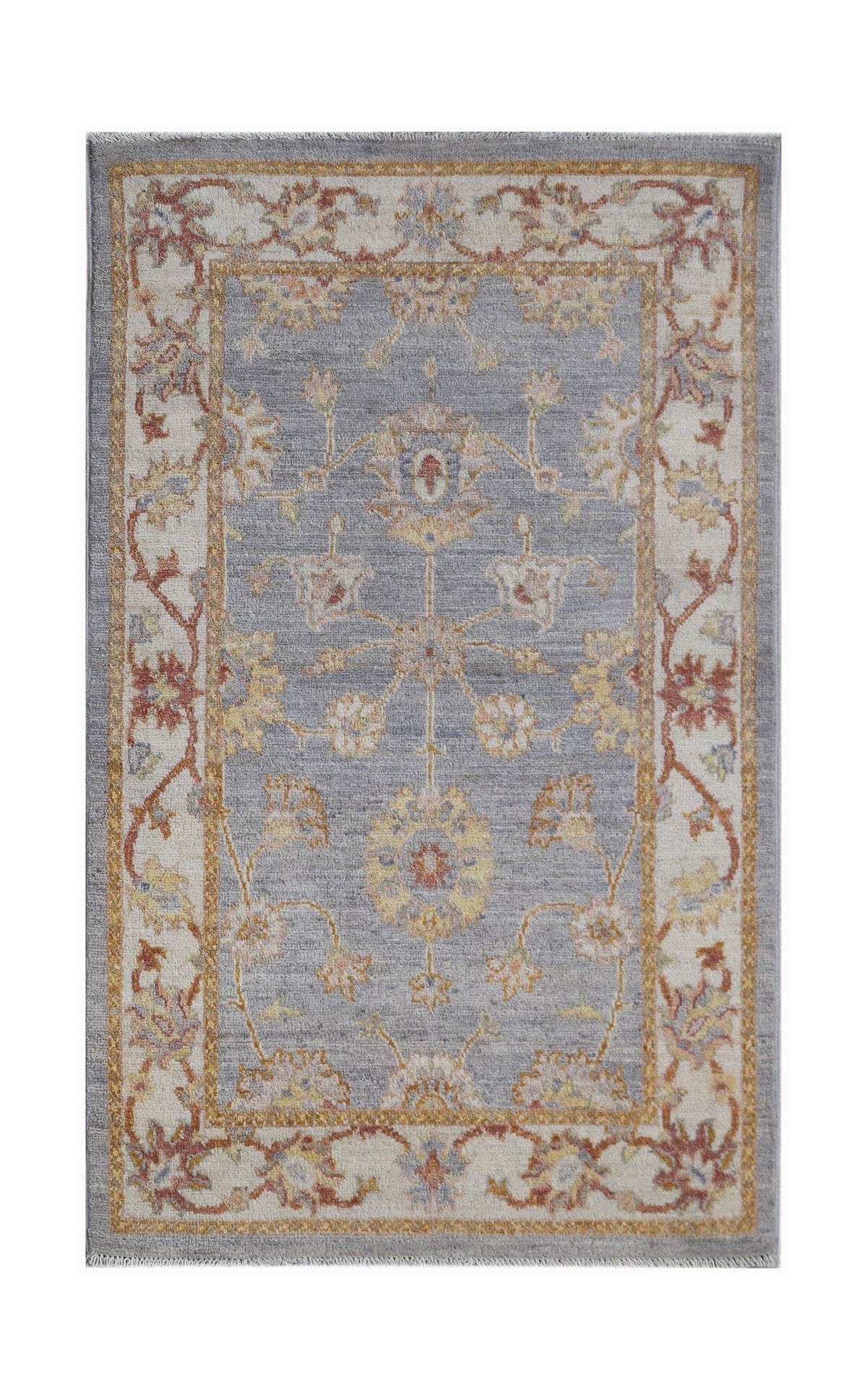 An Afghan Chobi rug featuring a traditional floral pattern in muted tones on a grey background.