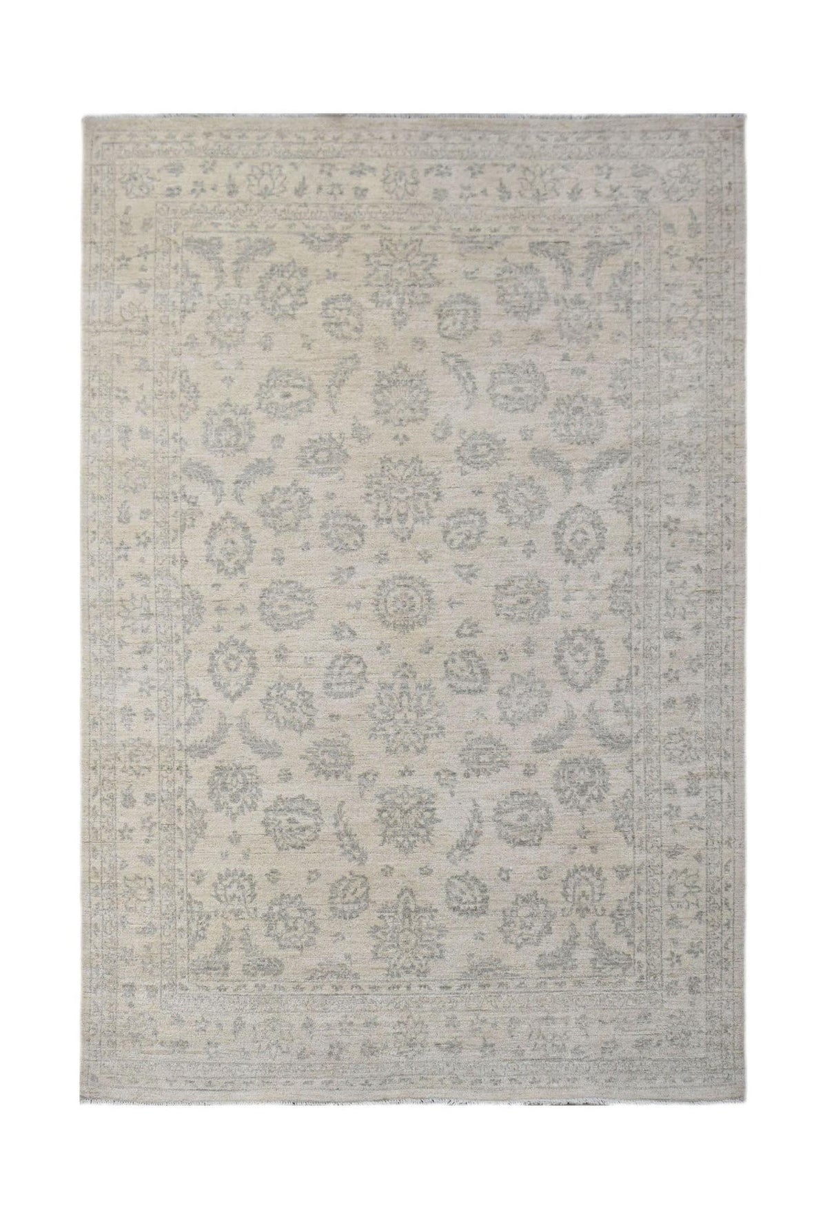 Hand-knotted Afghan Chobi rug featuring a soft cream and grey floral pattern with a low pile and fringed edges.
