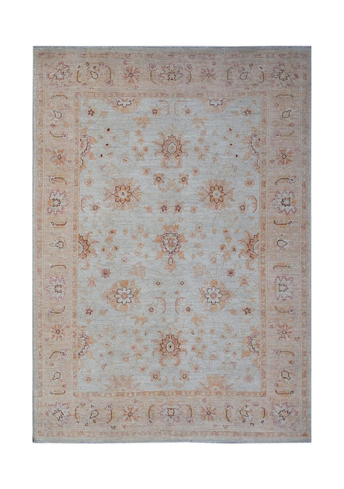 An Afghan Chobi rug featuring a traditional floral pattern in soft beige and muted orange tones.