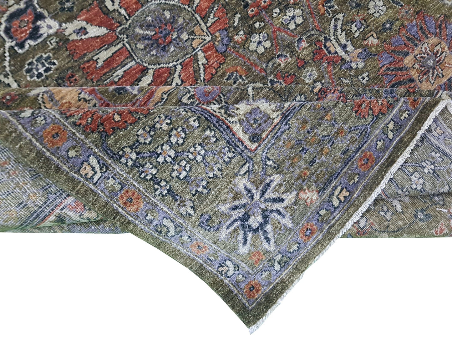 A handwoven Afghan Chobi rug featuring a traditional floral pattern in earthy tones.