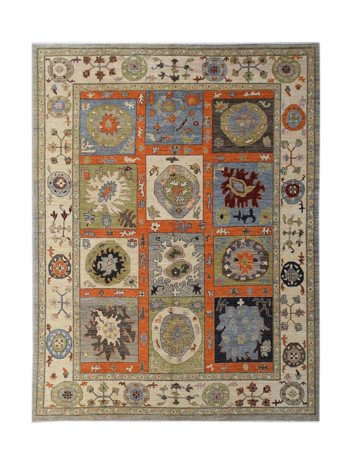 Handwoven Afghan Chobi rug featuring a geometric patchwork design in earthy, muted tones.
