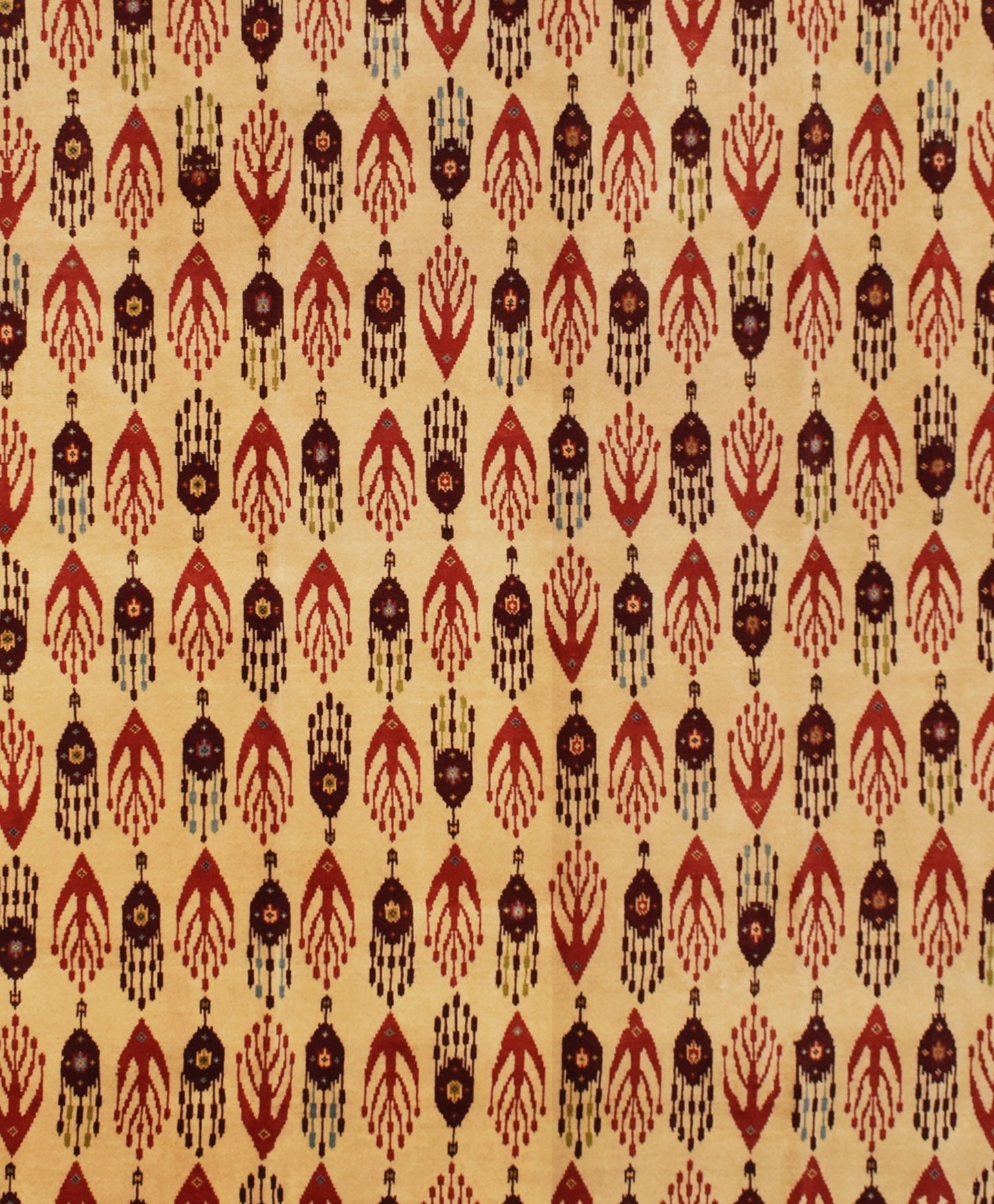An Afghan Chobi rug featuring a repeating pattern of dark red and brown geometric motifs on a tan background.