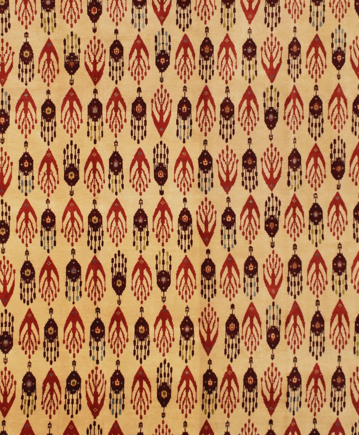 An Afghan Chobi rug featuring a repeating pattern of dark red and brown geometric motifs on a tan background.