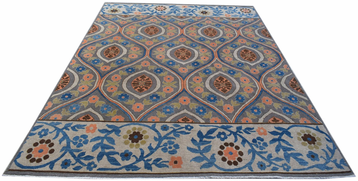 Handwoven Afghan Chobi rug featuring a grey field with floral medallions and a decorative border.