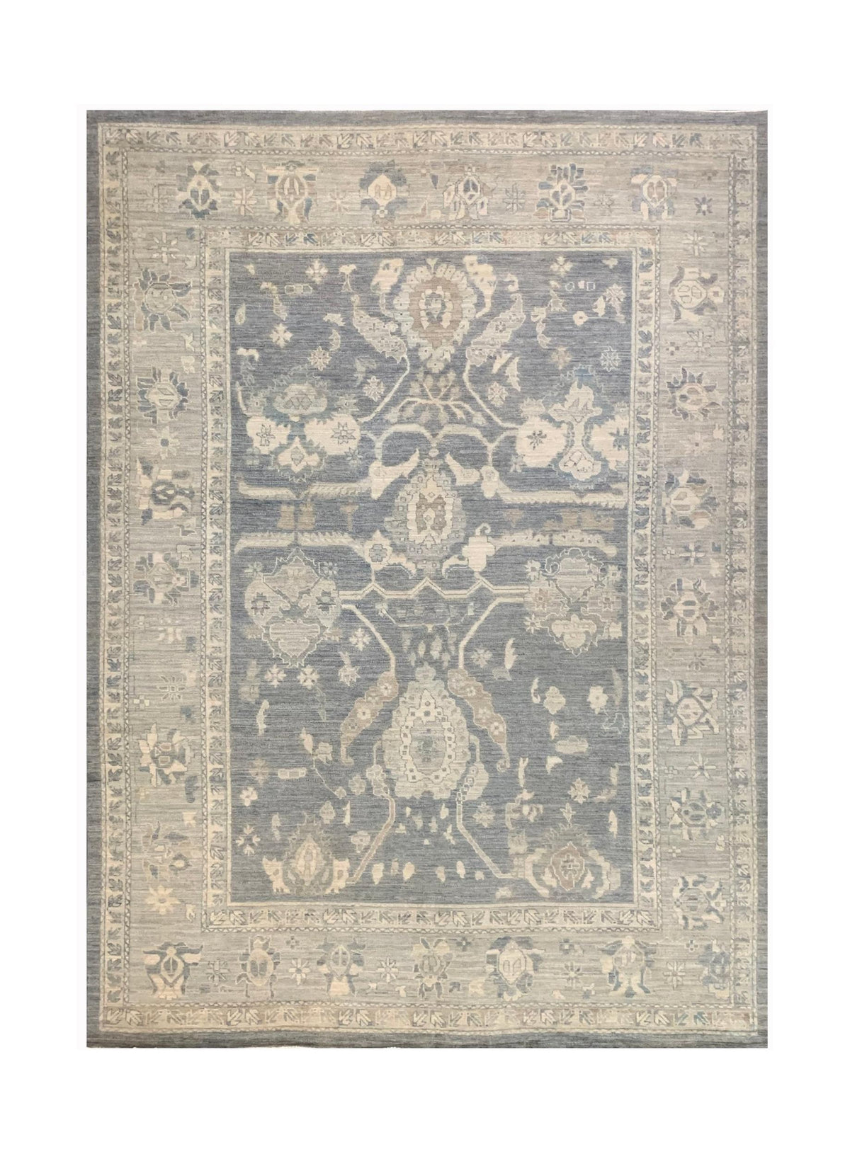 Handmade Afghan Chobi rug featuring a traditional floral pattern in shades of blue and beige.