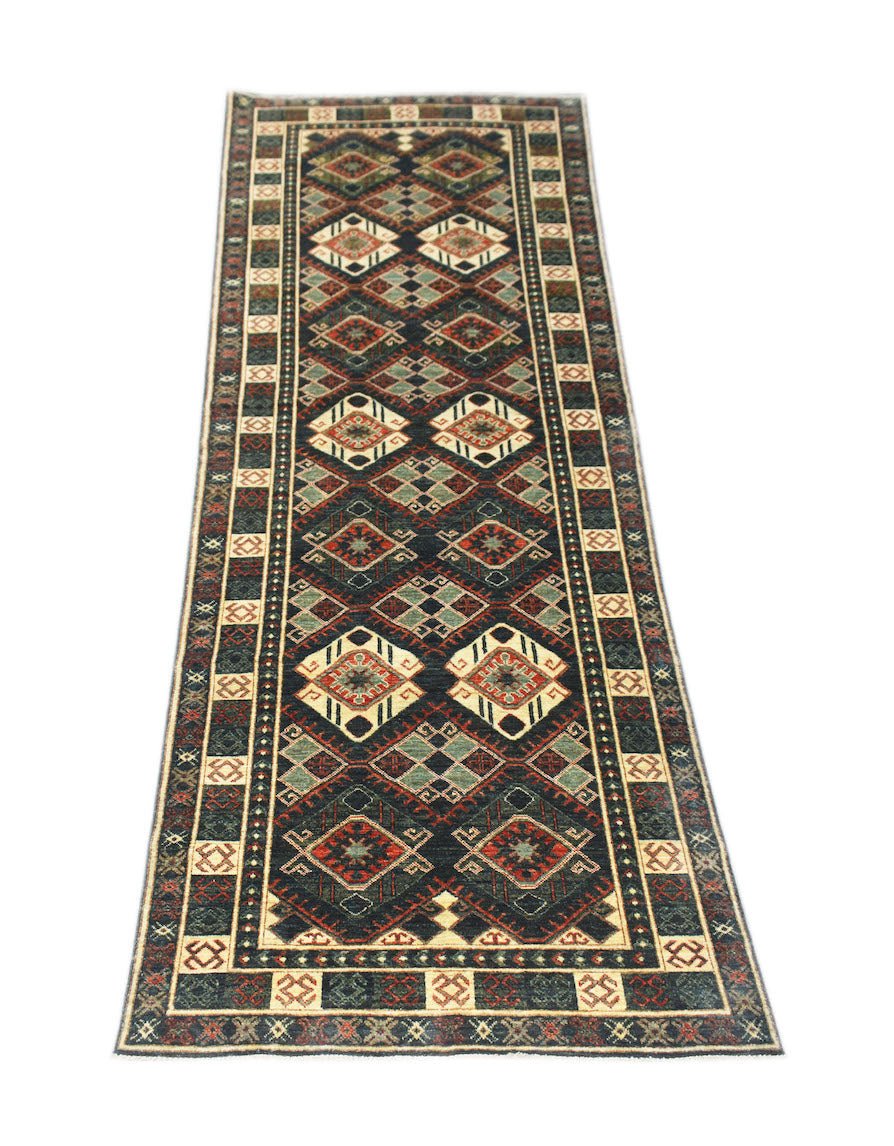 A handmade Afghan Chobi runner rug featuring a geometric diamond pattern in earthy tones.
