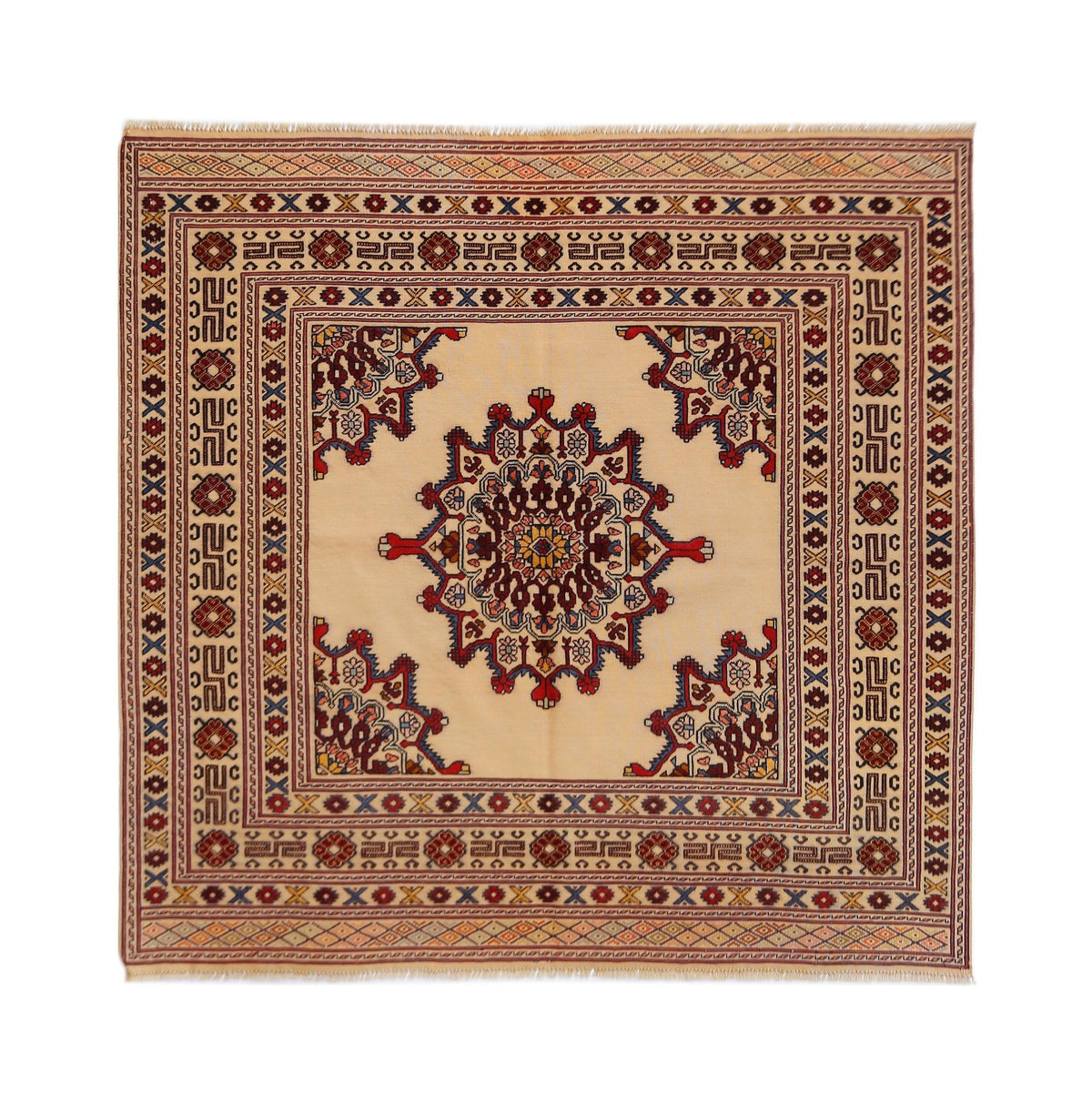 Hand-knotted Afghan Herati rug with a central floral medallion, geometric borders, and cream, red, and blue wool pile.