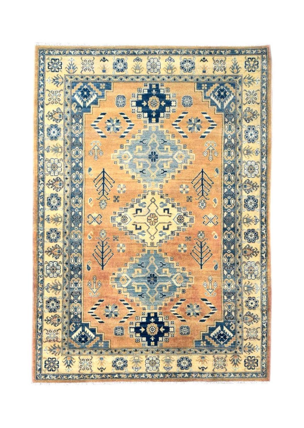 Handmade Afghan Kazakh rug featuring a geometric blue and beige pattern on an orange background.