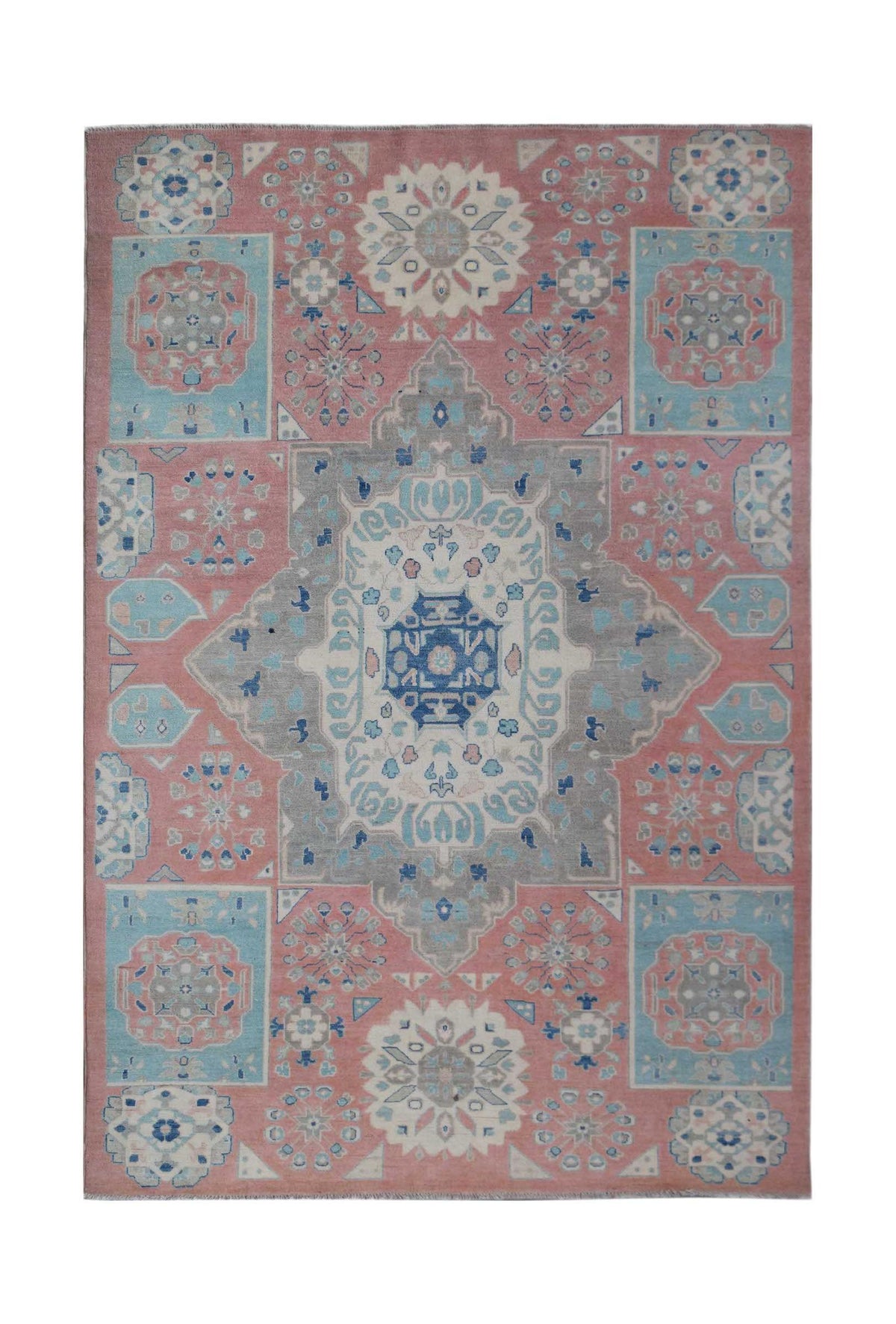 Handmade Afghan Kazakh rug featuring a geometric medallion pattern in pink, blue, and grey tones.