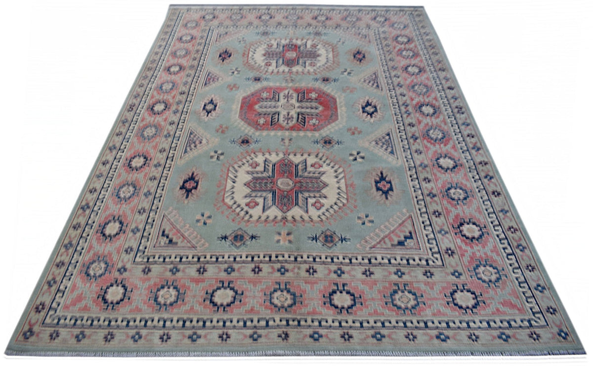 Handmade Afghan Kazakh rug featuring traditional geometric motifs in blue, red, and cream wool.