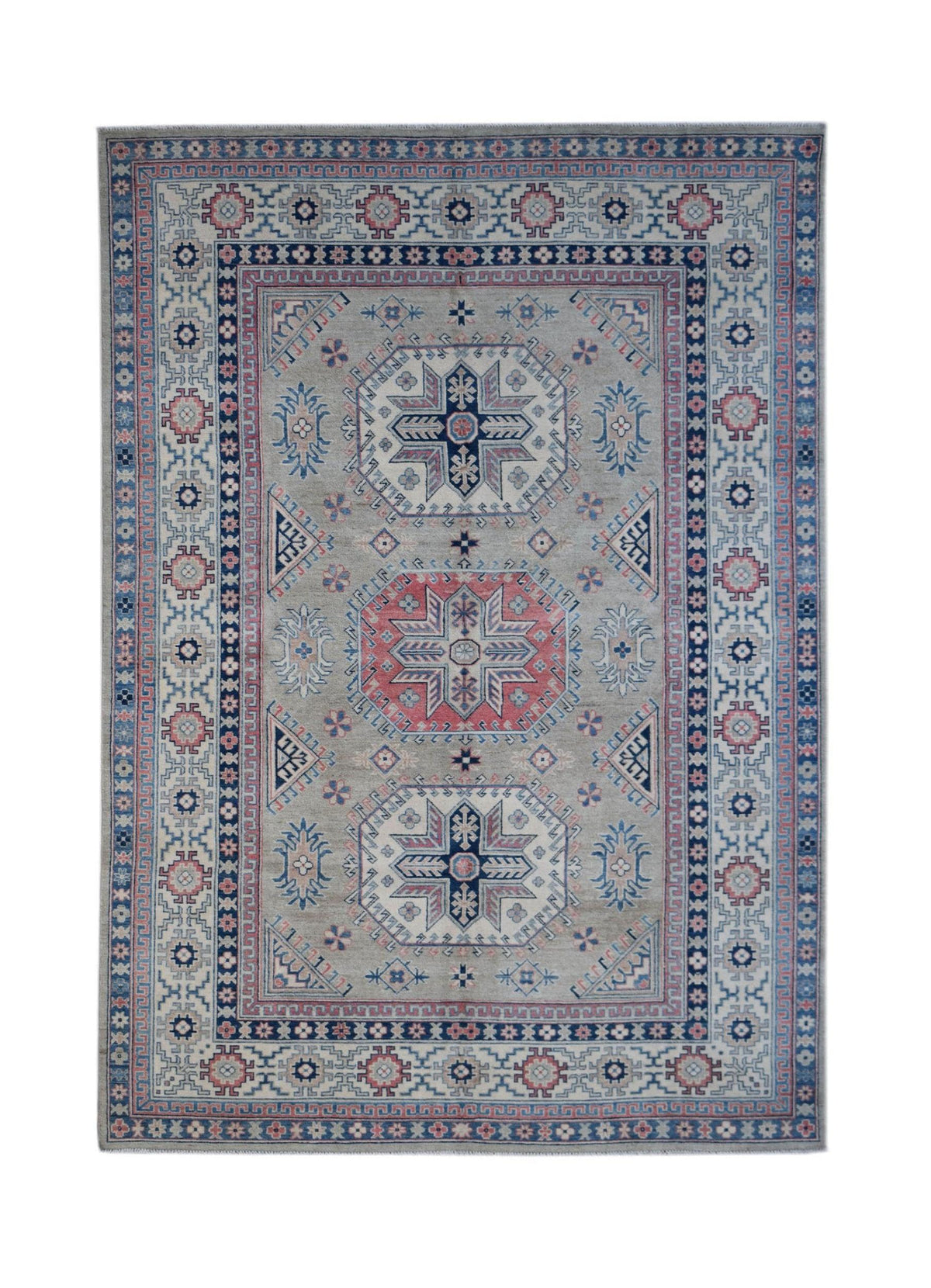A handmade Afghan Kazakh rug featuring traditional geometric motifs in blue, pink, and grey.