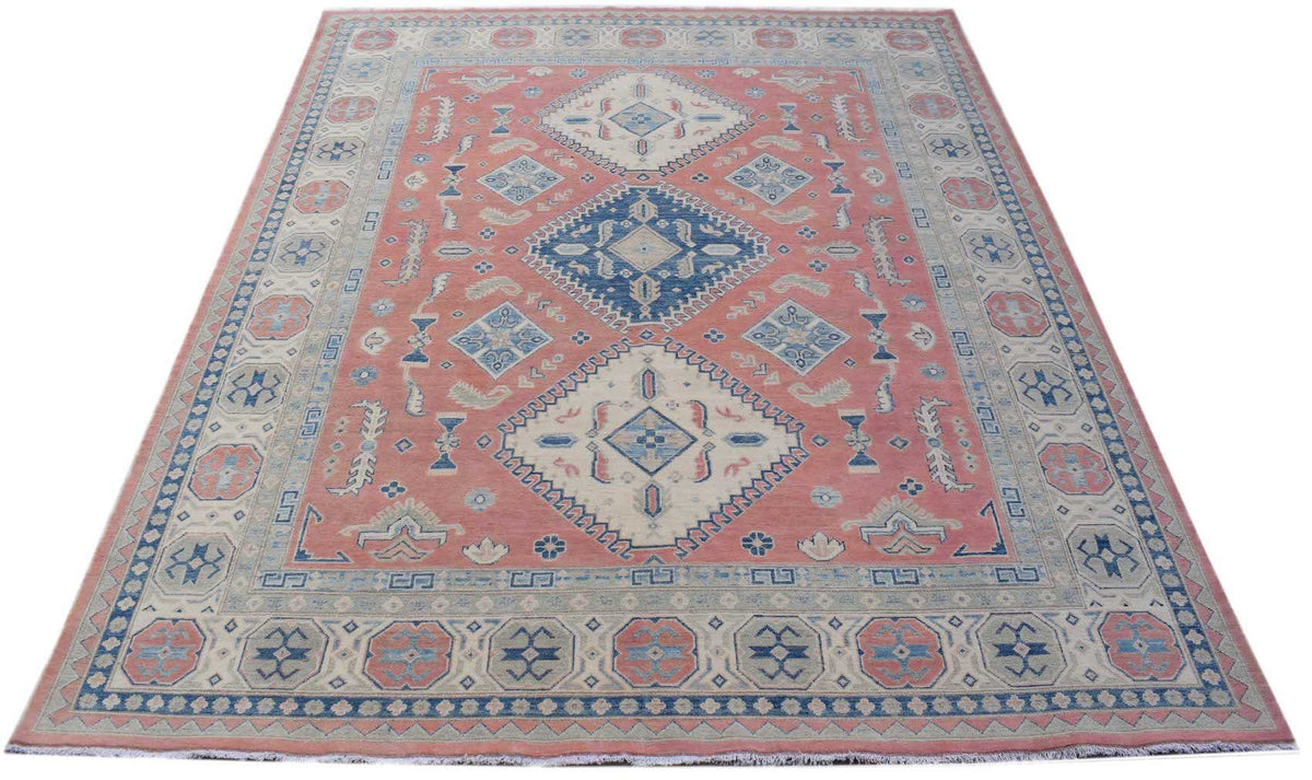 Handmade Afghan Kazakh rug featuring traditional geometric motifs in shades of pink and blue.