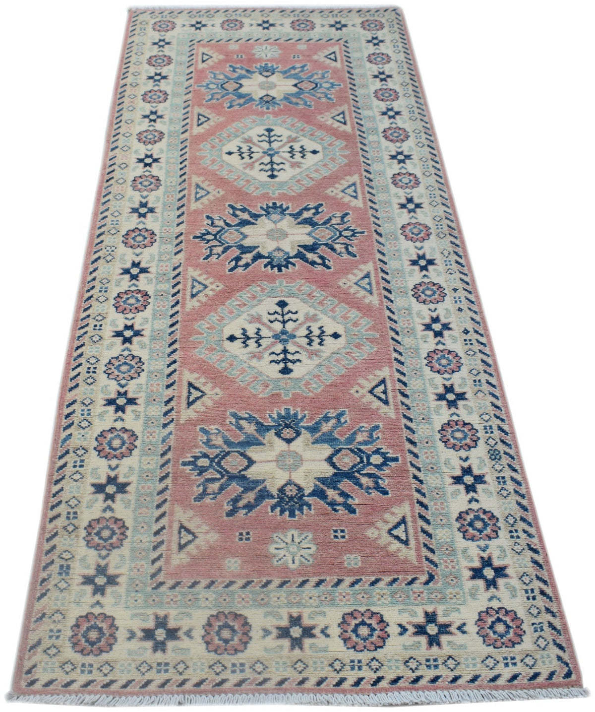 A handmade Afghan Kazakh runner rug featuring traditional geometric motifs in pink, blue, and cream.