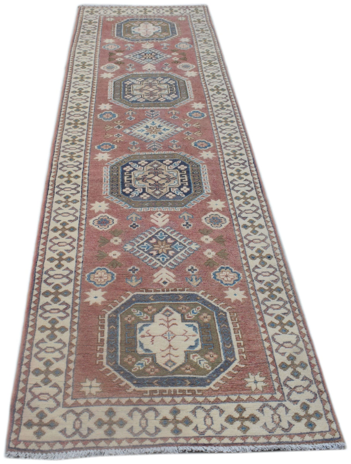 A handmade Afghan Kazakh runner rug featuring traditional geometric motifs in red and blue tones.