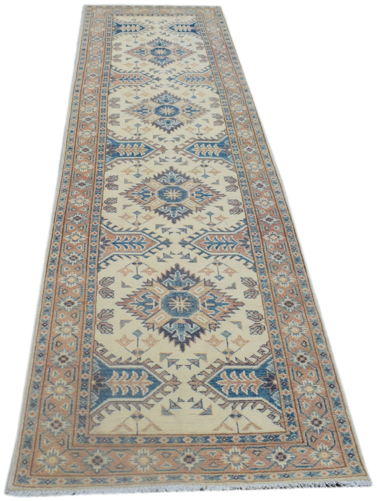 A handmade Afghan Kazakh runner rug featuring traditional geometric motifs in blue and tan.