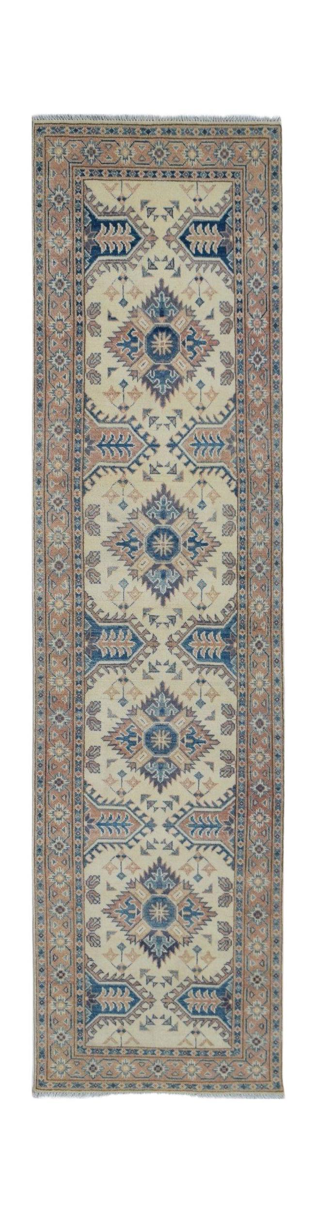 Handmade Afghan Kazakh runner rug featuring traditional geometric motifs in blue and tan.