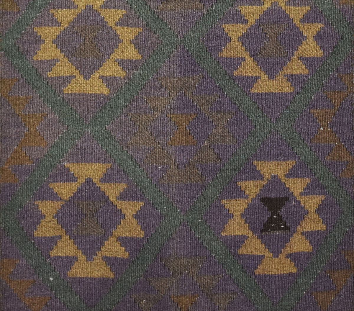 Handwoven Afghan Maimana kilim rug featuring a geometric diamond pattern in purple and gold.