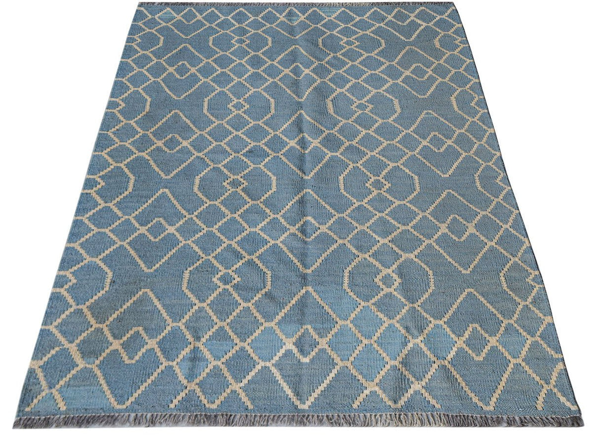 Afghan Maimana Kilim with a blue and cream geometric pattern.