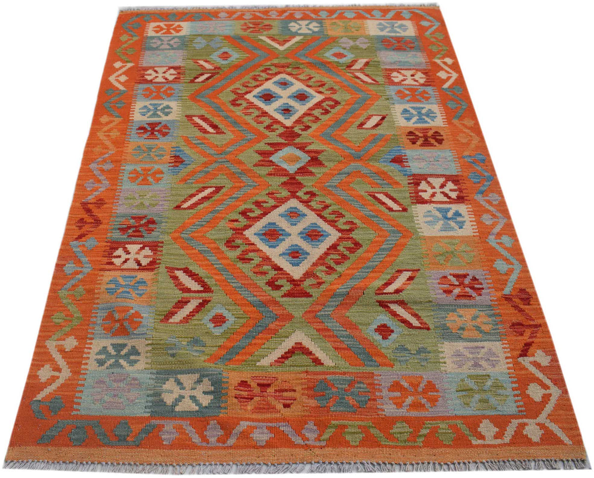 Handwoven Afghan Maimana kilim rug featuring a geometric diamond pattern in orange and green tones.