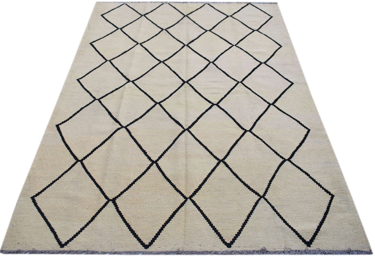 Handmade Afghan Maimana kilim rug featuring a cream background with a black diamond pattern.
