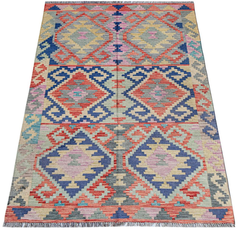 Handwoven Afghan Maimana kilim rug featuring a colorful geometric diamond pattern in wool.