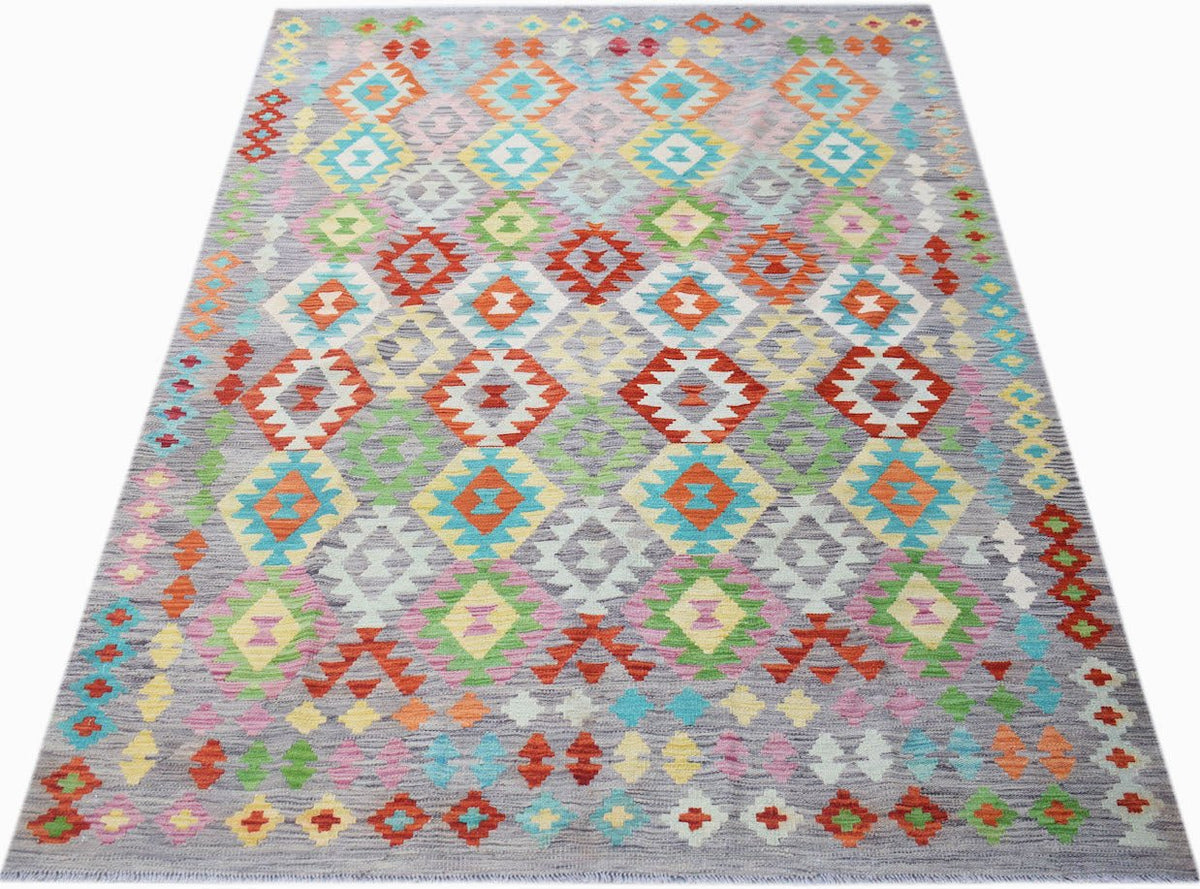 Handwoven Afghan Maimana kilim rug featuring a colorful geometric diamond pattern on a grey base.