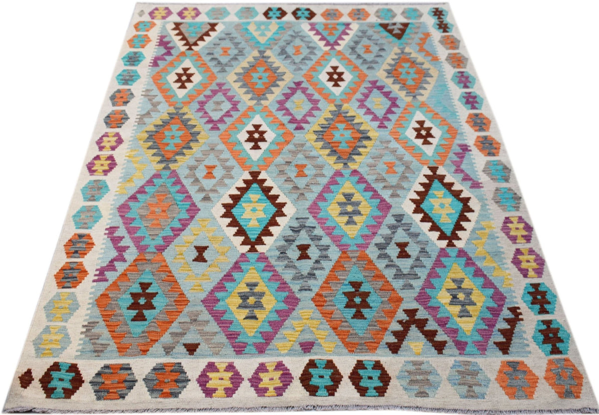 Handmade Afghan Maimana Kilim rug featuring a colorful geometric diamond pattern in wool.