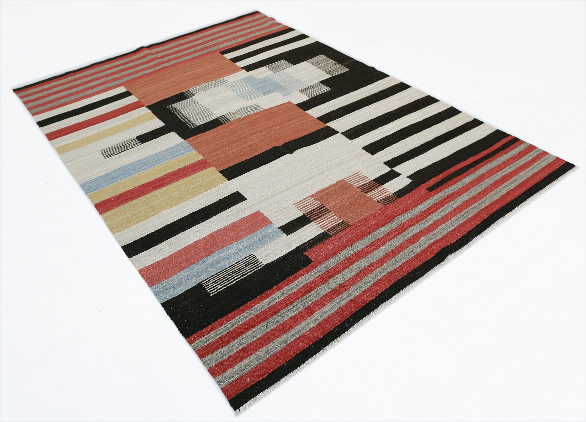Handwoven Afghan Maimana kilim rug featuring a geometric pattern of colorful stripes and blocks.