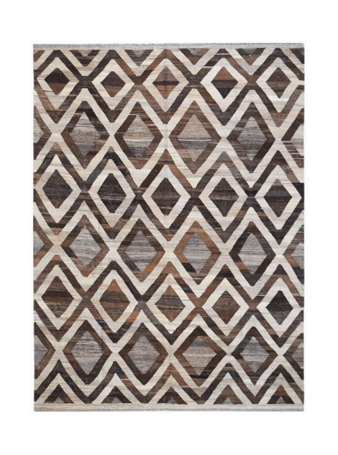 Handwoven Afghan Maimana kilim rug featuring a geometric diamond pattern in shades of brown and grey.