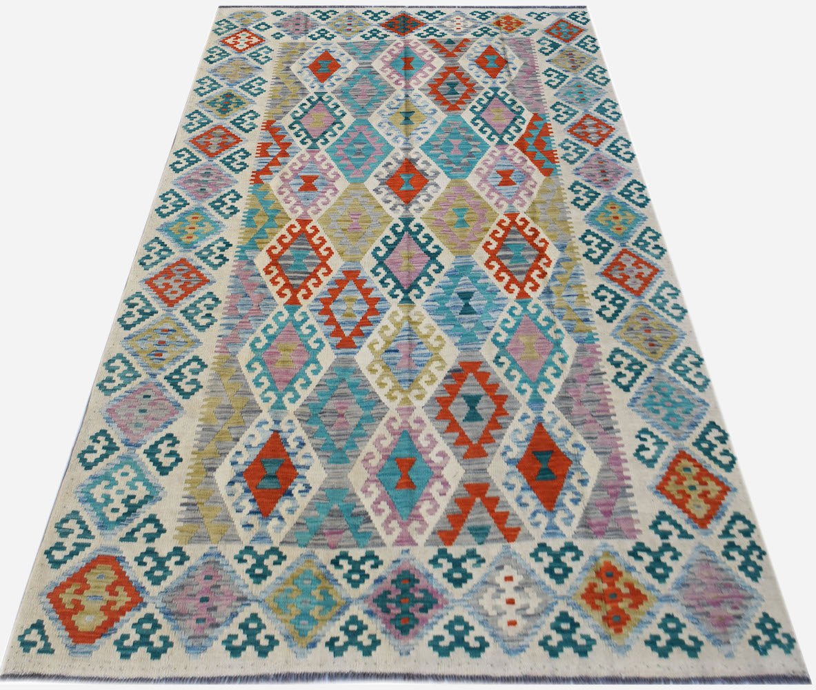 Handwoven Afghan Maimana Kilim rug featuring a colorful geometric diamond pattern in wool.
