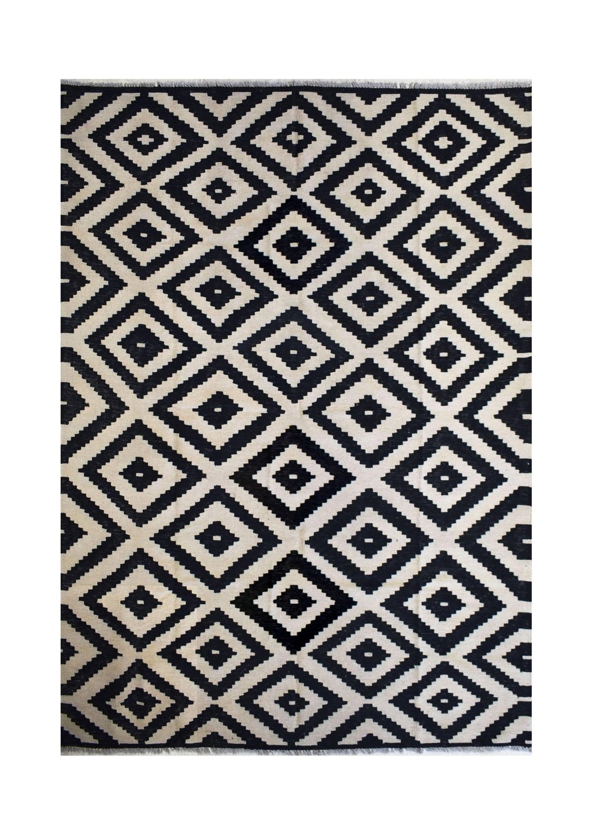 Afghan Maimana Kilim with a black and white geometric diamond pattern.