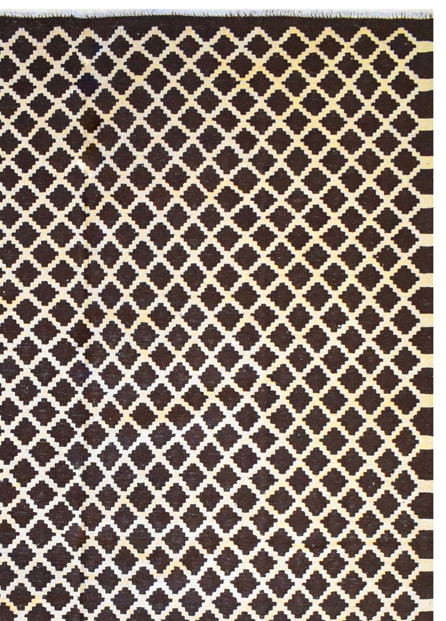 Handmade Afghan Maimana kilim rug featuring a dark brown and cream geometric lattice pattern.