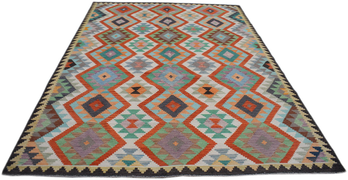 Handwoven Afghan Maimana kilim rug featuring a colorful geometric diamond pattern in wool.