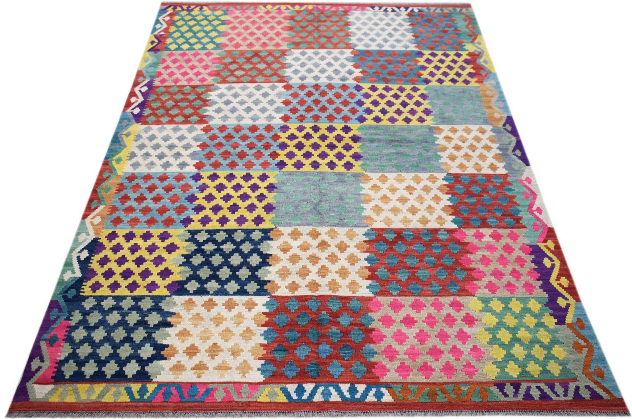 A handmade Afghan Maimana kilim rug featuring a vibrant, multicolored geometric patchwork pattern.