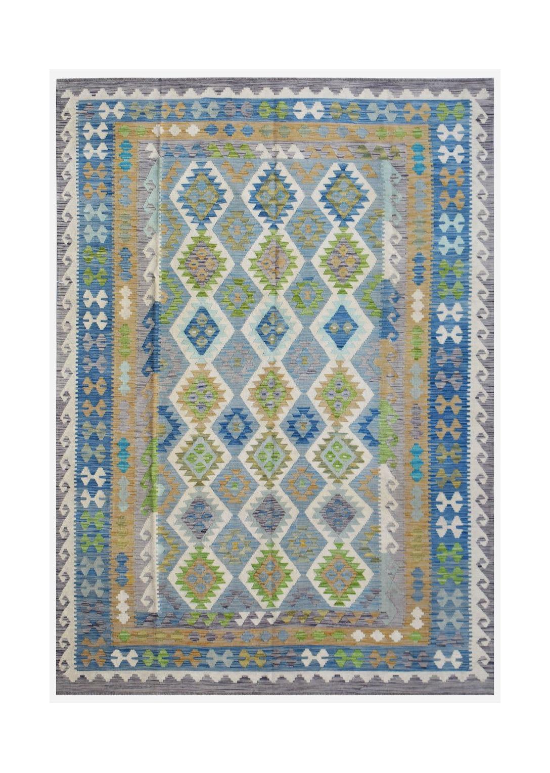 Handwoven Afghan Maimana kilim rug featuring a blue and green geometric diamond pattern.