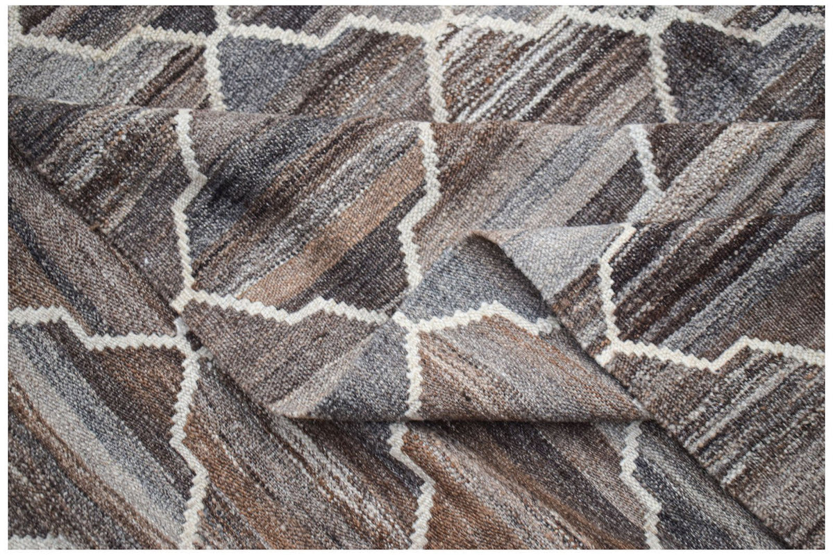 Afghan Maimana Kilim with geometric pattern in brown and grey tones.