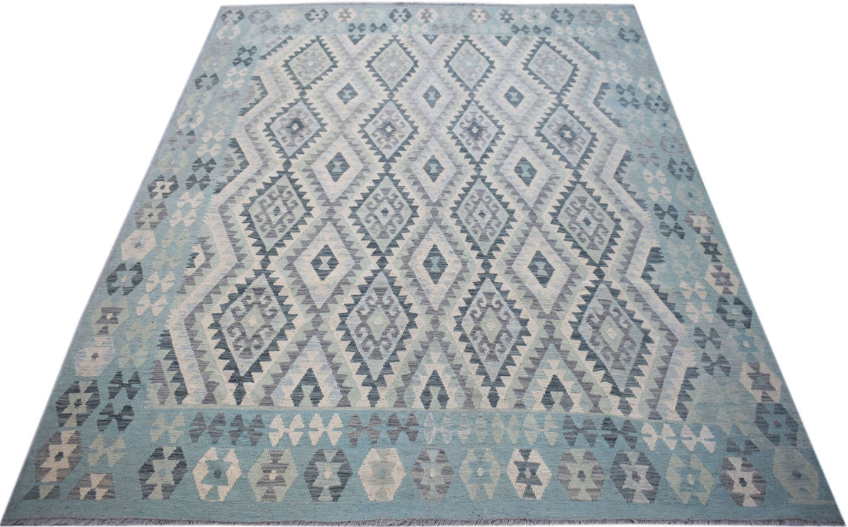Handwoven Afghan Maimana kilim rug featuring a light blue and grey geometric diamond pattern.