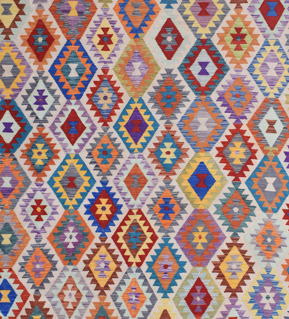 Handmade Afghan Maimana kilim rug featuring a vibrant, multicolored geometric diamond pattern.